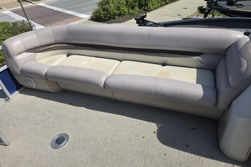 Slide: The Image of 2014 Sun Tracker Party Barge 24 pontoon boat with beige seating. - 4