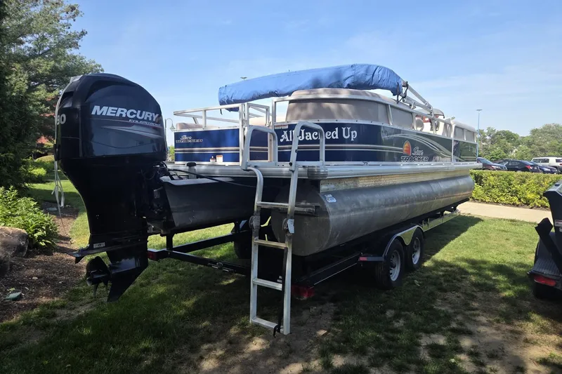 Slide: The Image of 2014 Sun Tracker Party Barge 24 pontoon boat with Mercury engine on trailer. - 6
