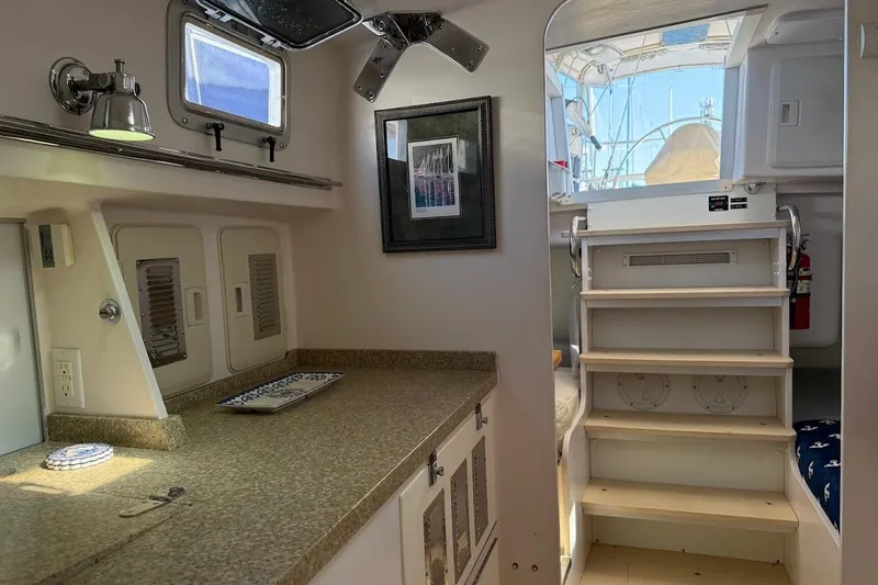 Slide: The Image of Interior of 2011 Reliance 44 yacht with stairs and countertop. - 20
