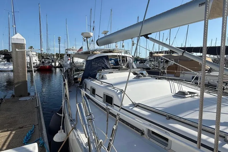 Slide: The Image of Sailboat docked at marina, Reliance 44 model, 2011, surrounded by other boats. - 29