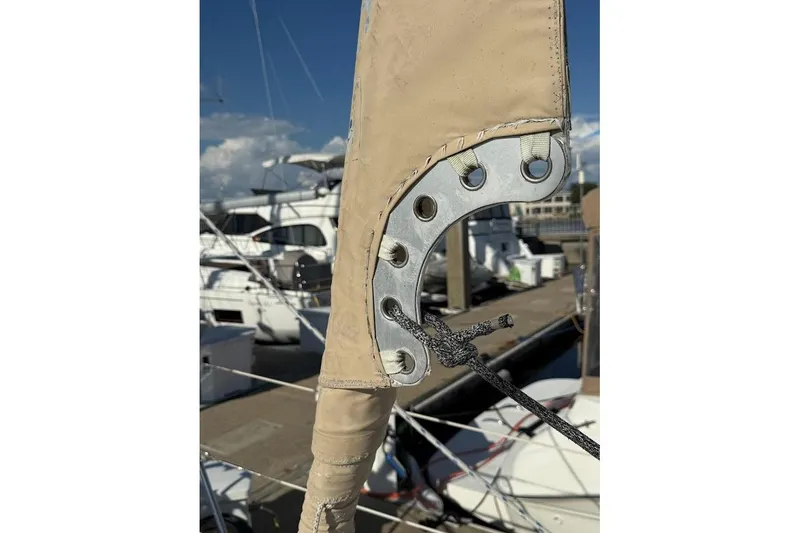 Slide: The Image of Close-up of a sailboat rigging detail, Reliance 44, 2011 model, at a marina. - 35