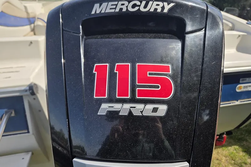 Slide: The Image of Mercury 115 Pro outboard motor on 1995 Sunbird Corsair boat. - 2
