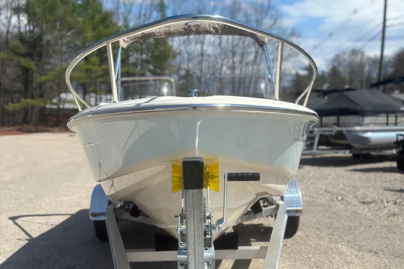 Slide: The Image of Scout 175 Sport Dorado 2025 on a trailer, front view. - 4