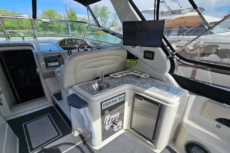 Slide: The Image of Luxurious 1997 Regal Commodore 402 yacht interior with cockpit bar and modern amenities. - 10