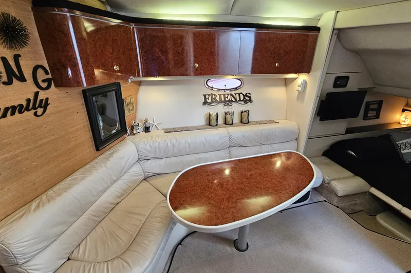 Slide: The Image of Luxurious interior of a 1997 Regal Commodore 402 yacht with elegant seating and decor. - 19
