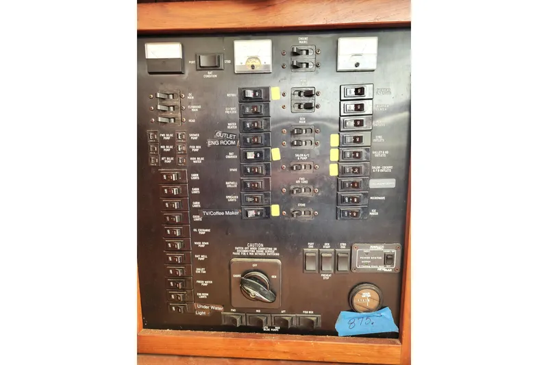 Slide: The Image of Interior of 1993 Ocean Yachts 38 Super Sport with TV and wooden cabinetry. - 16