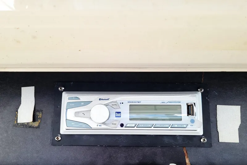 Slide: The Image of VHF radio system on 1993 Ocean Yachts 38 Super Sport boat dashboard. - 8