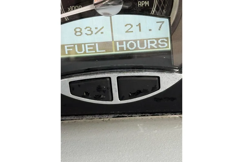 Slide: The Image of Dashboard display of 2023 Barletta Corsa 23U showing 83% fuel and 21.7 hours. - 13