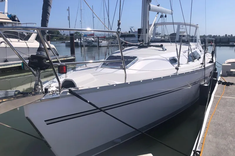 The Image of 2020 Catalina 355 sailboat docked at a marina, showcasing sleek design and modern features. - 0