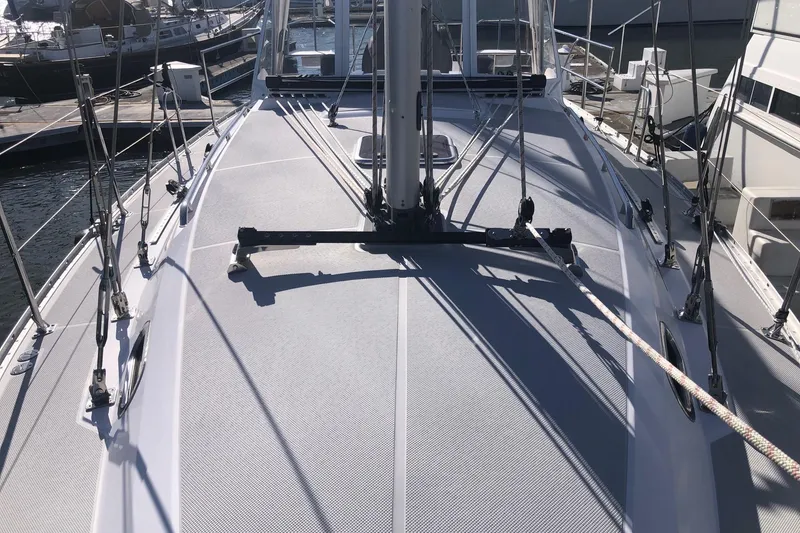 Slide: The Image of Deck view of a 2020 Catalina 355 sailboat docked at a marina. - 11