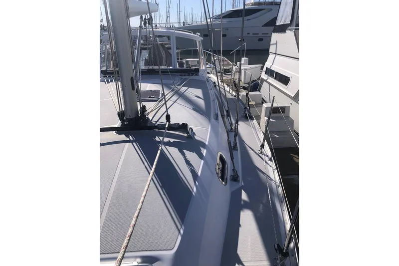 Slide: The Image of Catalina 355 sailboat deck, 2020 model, docked at marina with other boats. - 13