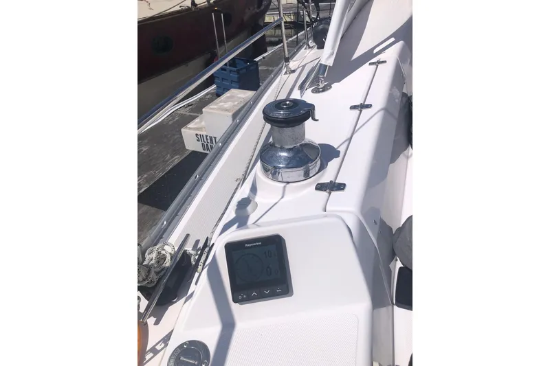 Slide: The Image of Sailboat deck of 2020 Catalina 355 with winch and navigation display. - 18