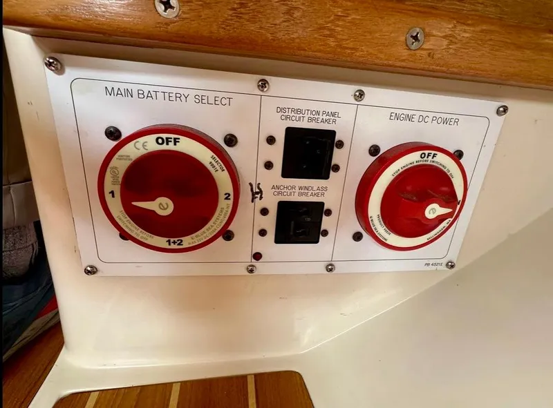Slide: The Image of Control panel of a 2007 Catalina 36 MkII sailboat with battery selectors and circuit breakers. - 13