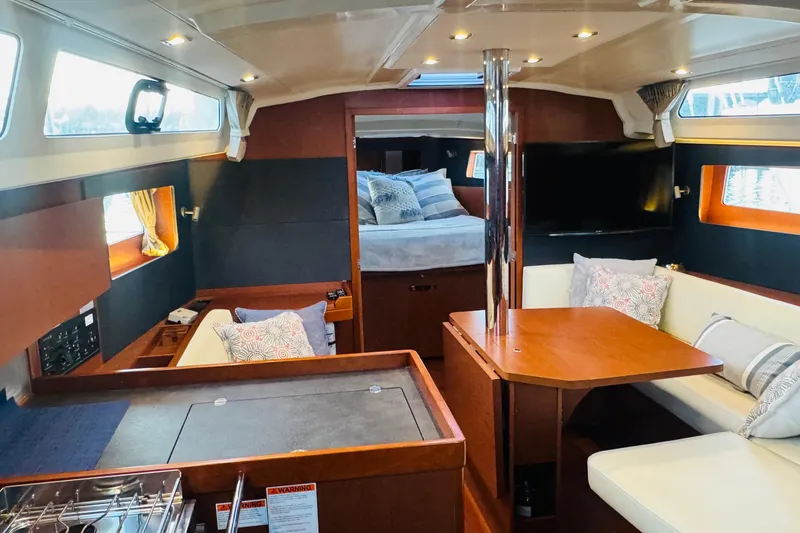 Slide: The Image of Interior of 2018 Beneteau Oceanis 41.1 yacht with cozy seating and modern design. - 7