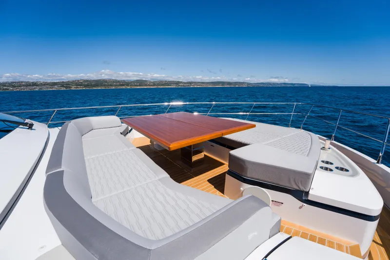Slide: The Image of Luxurious 2024 Pearl 72 yacht deck with seating and ocean view. - 101