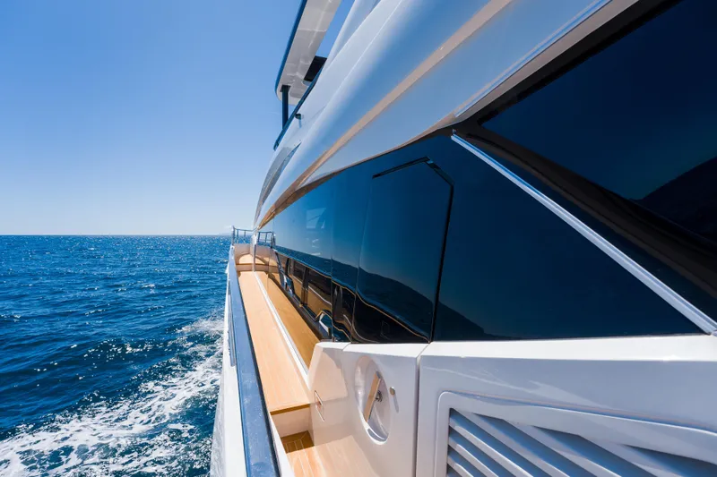 Slide: The Image of Luxurious 2024 Pearl 72 yacht cruising on open sea under clear blue sky. - 108