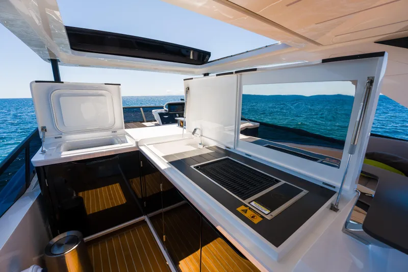 Slide: The Image of Outdoor kitchen on 2024 Pearl 72 yacht with ocean view. - 115