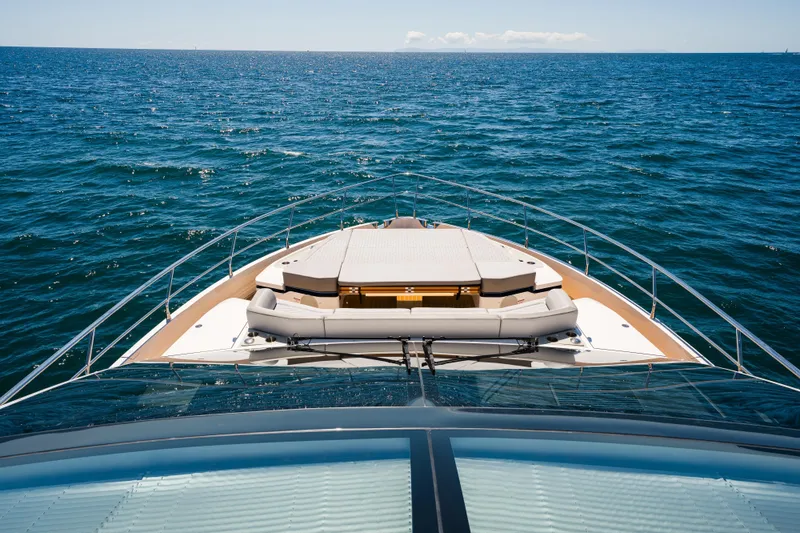 Slide: The Image of Bow view of 2024 Pearl 72 yacht cruising on open sea. - 117