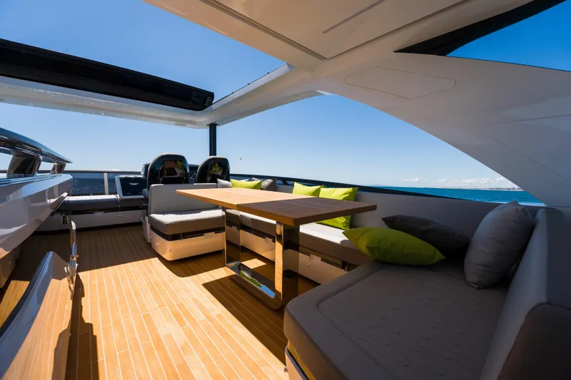 Slide: The Image of Luxurious 2024 Pearl 72 yacht interior with modern seating and ocean view. - 120