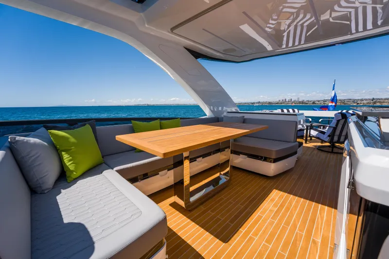 Slide: The Image of Luxurious 2024 Pearl 72 yacht deck with elegant seating and ocean view. - 123