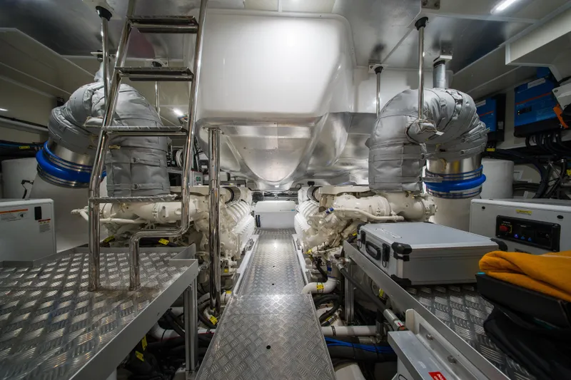 Slide: The Image of Engine room of 2024 Pearl 72 yacht with advanced machinery and equipment. - 125