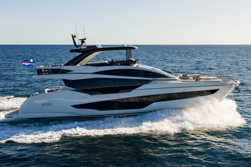 Slide: The Image of Luxurious 2024 Pearl 72 yacht cruising on open sea under clear skies. - 13