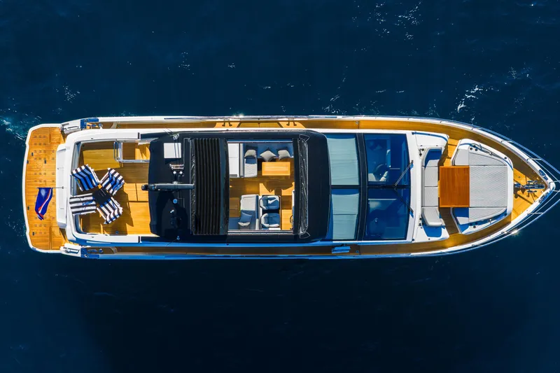 Slide: The Image of Aerial view of 2024 Pearl 72 luxury yacht on open water. - 18