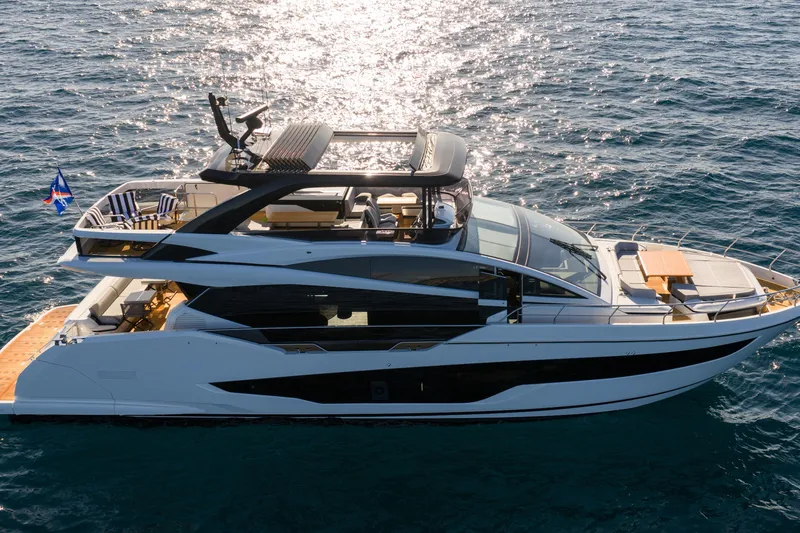Slide: The Image of Luxurious 2024 Pearl 72 yacht cruising on sparkling ocean waters. - 20