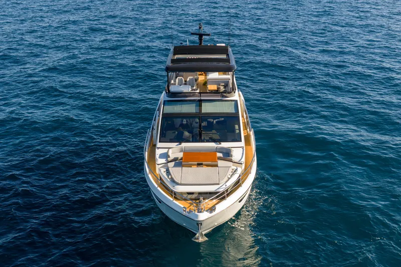 Slide: The Image of Luxurious 2024 Pearl 72 yacht cruising on open blue sea. - 22