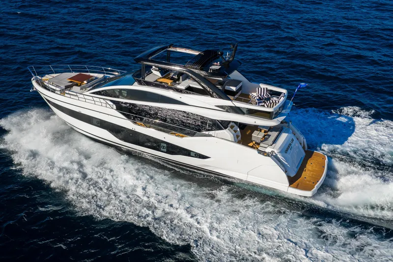 Slide: The Image of Luxurious 2024 Pearl 72 yacht cruising on open sea, showcasing sleek design and elegance. - 3