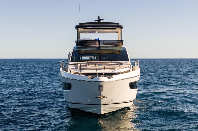 Slide: The Image of Front view of 2024 Pearl 72 yacht cruising on open sea. - 30