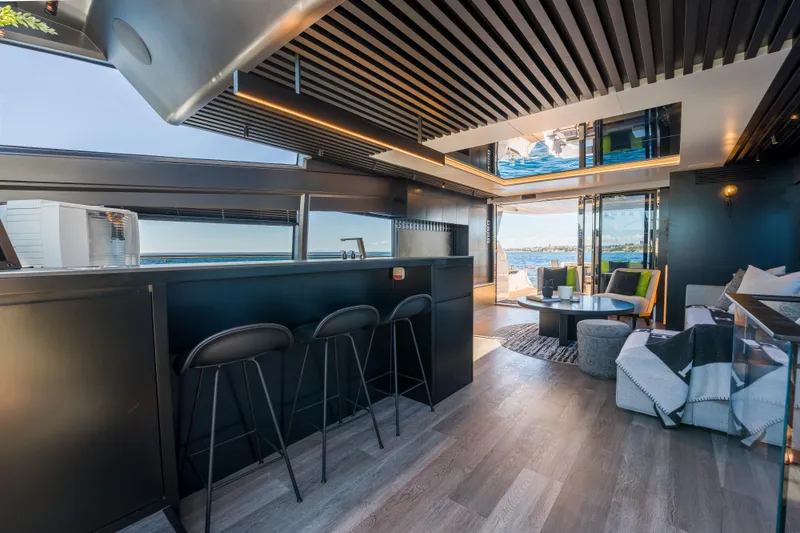 Slide: The Image of Luxurious interior of 2024 Pearl 72 yacht with modern design and ocean view. - 34