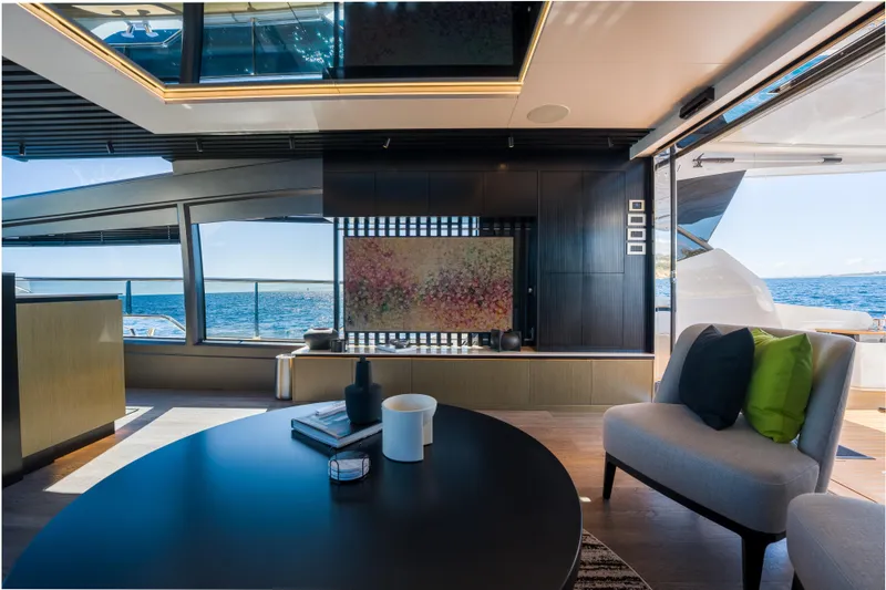 Slide: The Image of Luxurious interior of 2024 Pearl 72 yacht with ocean view and modern decor. - 38
