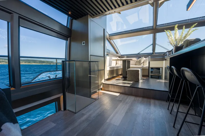 Slide: The Image of Luxurious interior of 2024 Pearl 72 yacht with panoramic ocean views and modern design. - 40