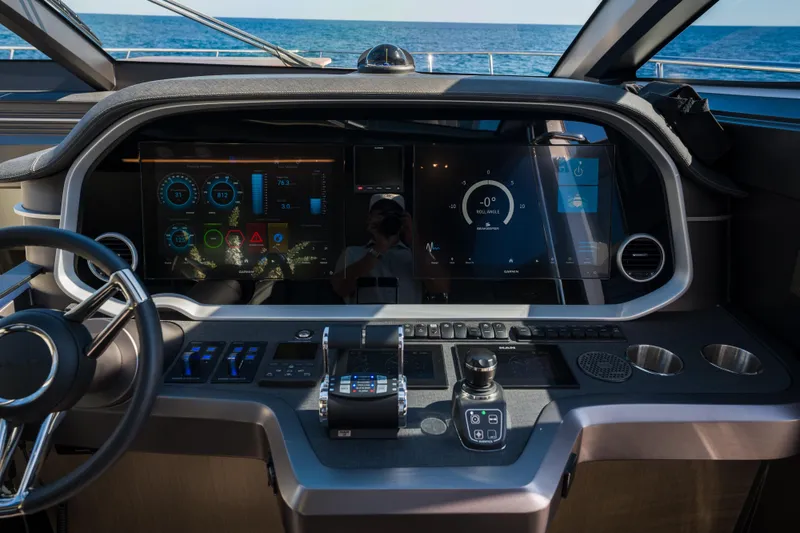 Slide: The Image of Cockpit of 2024 Pearl 72 yacht with advanced navigation displays and controls. - 45
