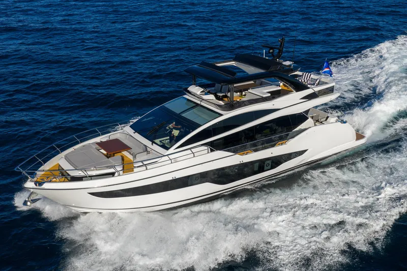 Slide: The Image of Luxurious 2024 Pearl 72 yacht cruising on open sea, showcasing sleek design and elegance. - 5