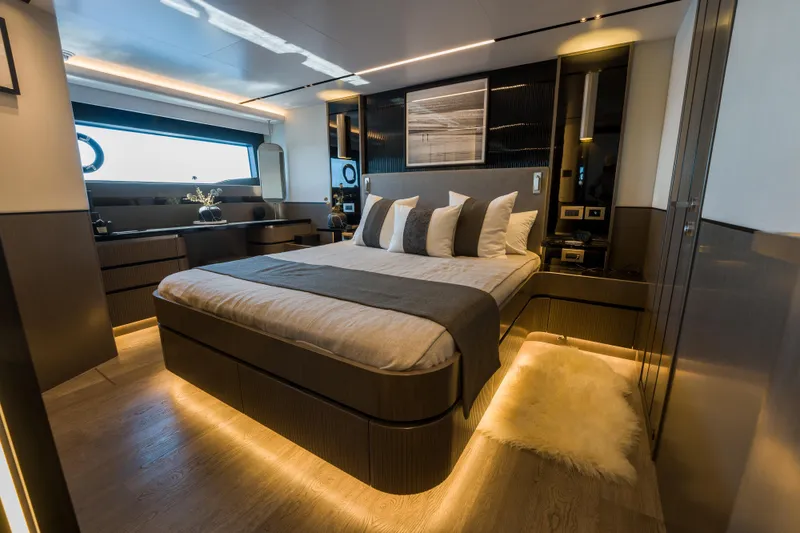 Slide: The Image of Luxurious bedroom interior of 2024 Pearl 72 yacht, featuring modern design and ambient lighting. - 57