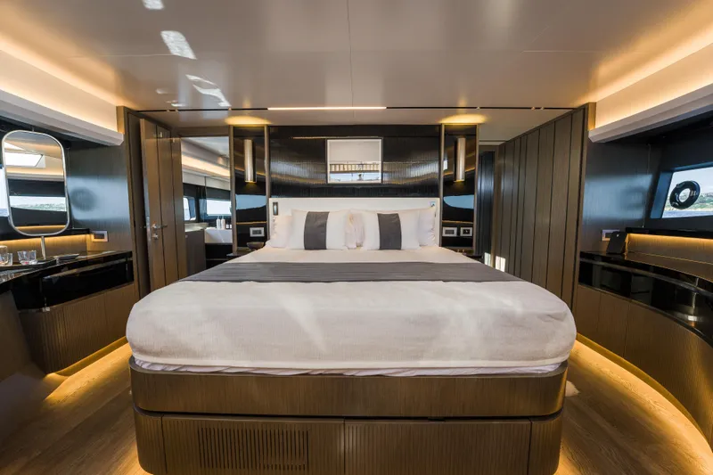 Slide: The Image of Luxurious bedroom interior of 2024 Pearl 72 yacht, featuring modern design and ambient lighting. - 63