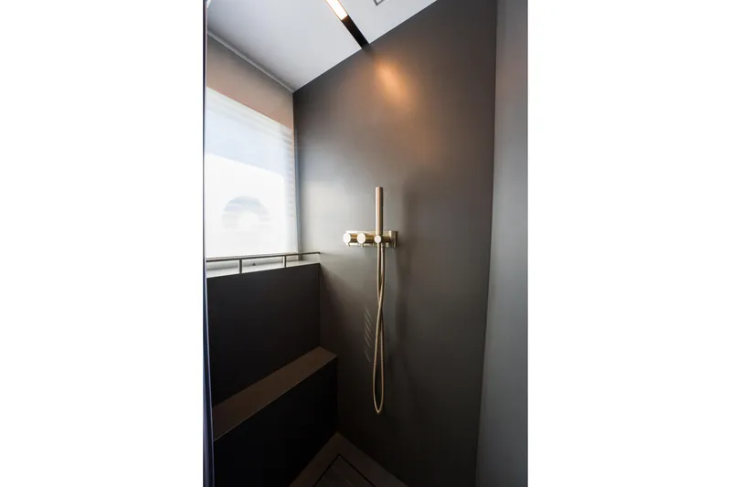 Slide: The Image of Modern shower area with sleek design in Pearl 72, 2024 model. - 70