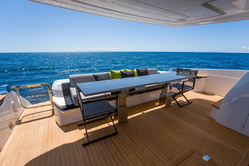 Slide: The Image of Luxurious Pearl 72 yacht deck with modern seating, ocean view, 2024 model. - 91