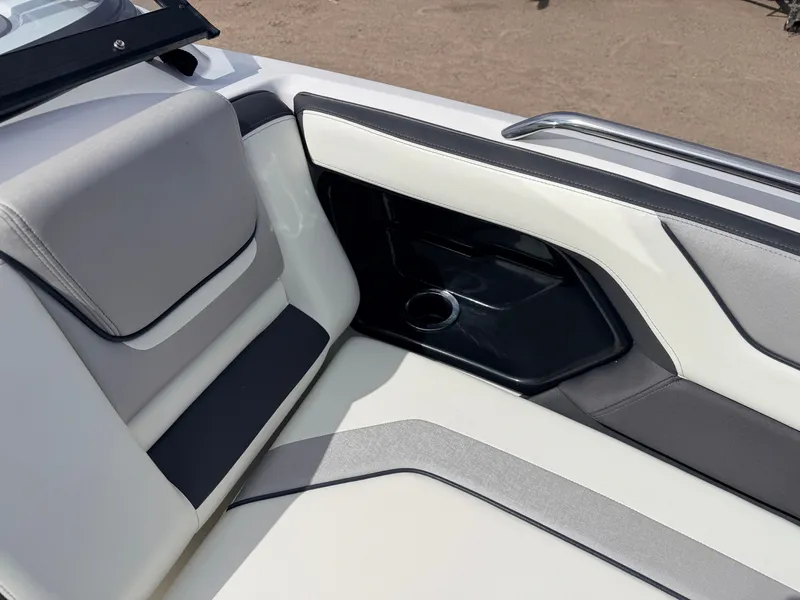 Slide: The Image of Interior of 2020 Yamaha 212S Jet Boat with seating and cup holder. - 14