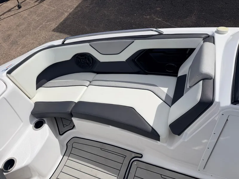 Slide: The Image of 2020 Yamaha 212S Jet Boat, luxurious seating, gray and white upholstery. - 17