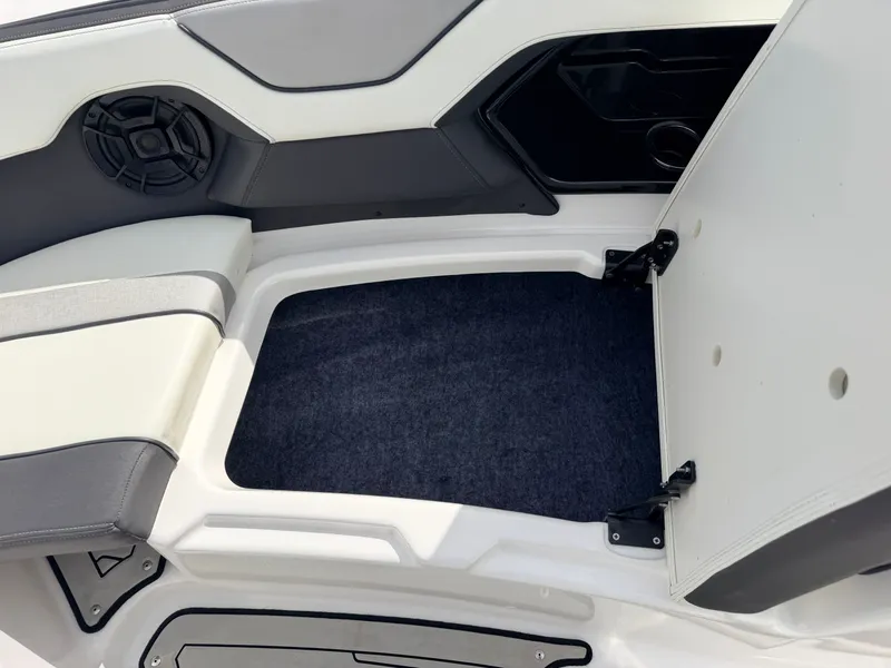 Slide: The Image of Yamaha 212S Jet Boat 2020, storage compartment with speaker. - 18