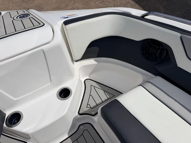 Slide: The Image of Interior of a 2020 Yamaha 212S Jet Boat with seating area. - 19