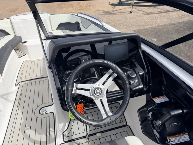 Slide: The Image of Yamaha 212S Jet Boat 2020, steering console with wheel and instruments. - 28