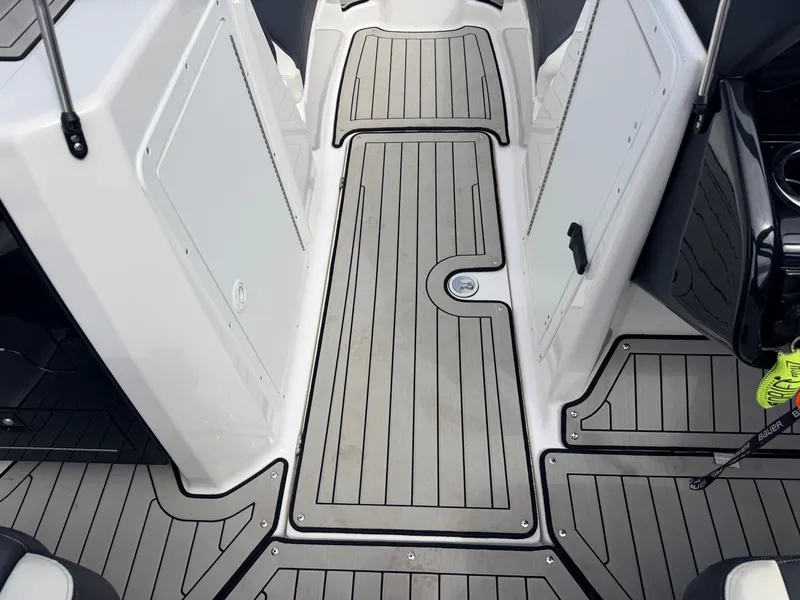 Slide: The Image of Interior of 2020 Yamaha 212S Jet Boat with gray flooring. - 32