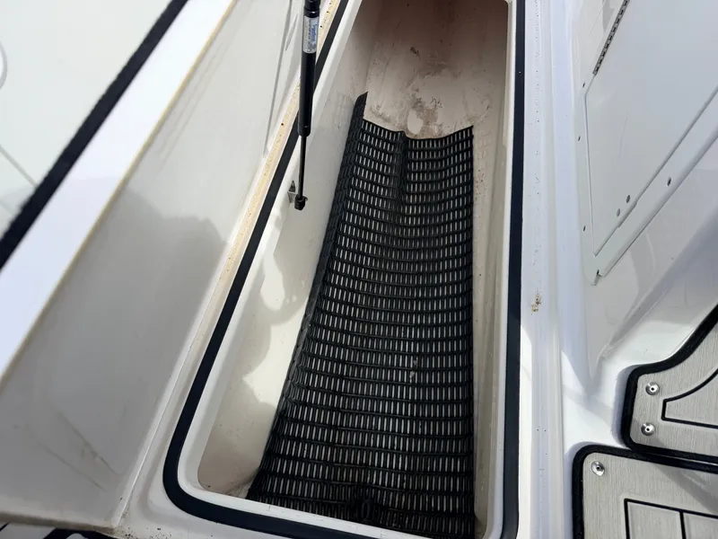 Slide: The Image of Yamaha 212S Jet Boat 2020 storage compartment with non-slip mat. - 33