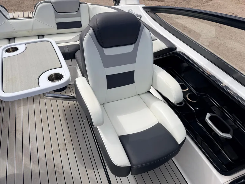 Slide: The Image of Interior of 2020 Yamaha 212S Jet Boat with seating and table. - 36