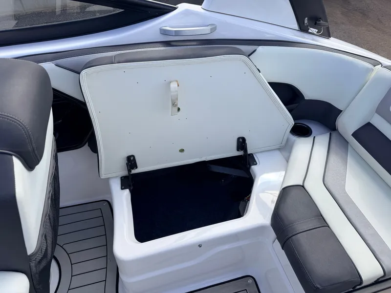 Slide: The Image of 2020 Yamaha 212S Jet Boat with open storage compartment. - 45