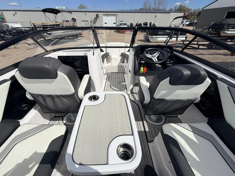 Slide: The Image of Interior of 2020 Yamaha 212S Jet Boat with table and seating. - 6